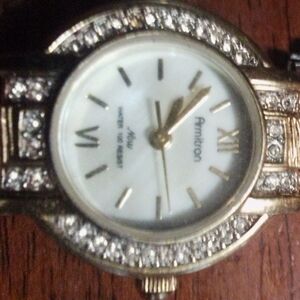 Ladies wrist watch, mother of pearl face backing, water proof